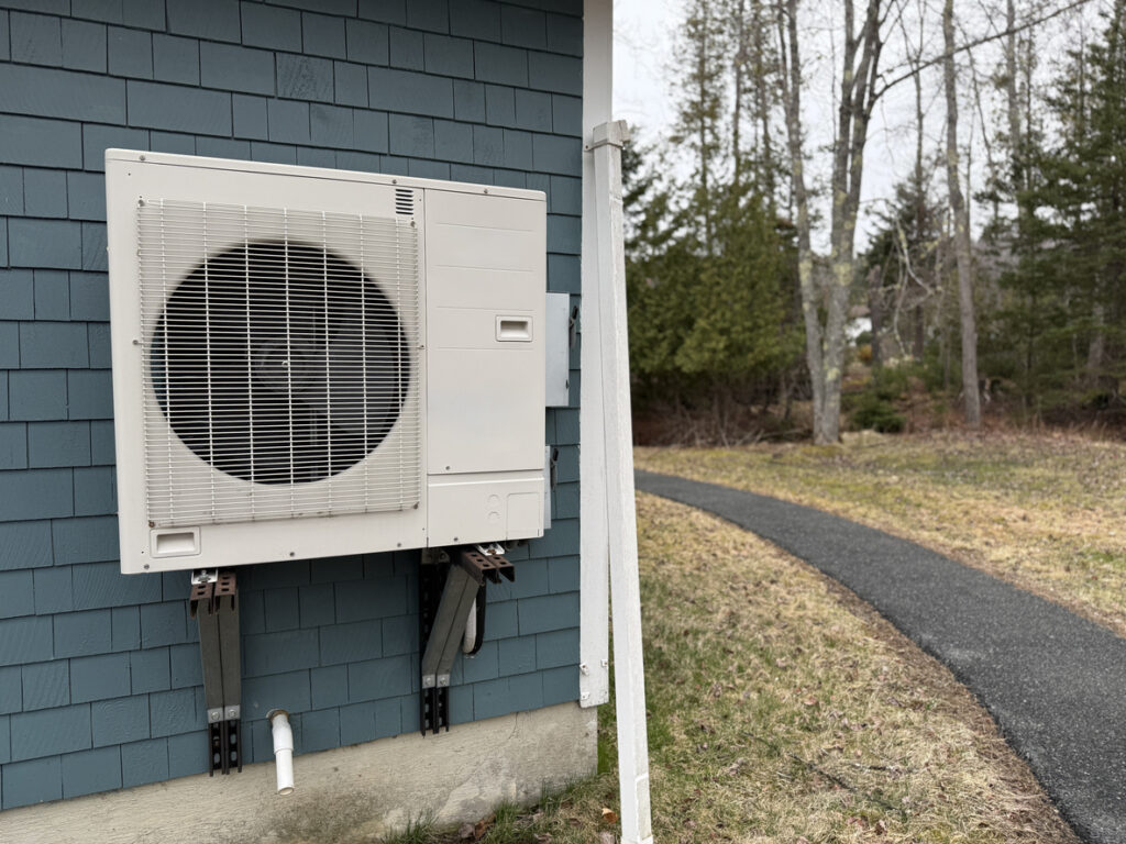 Heat pump mounted on the side of a West Virginia home