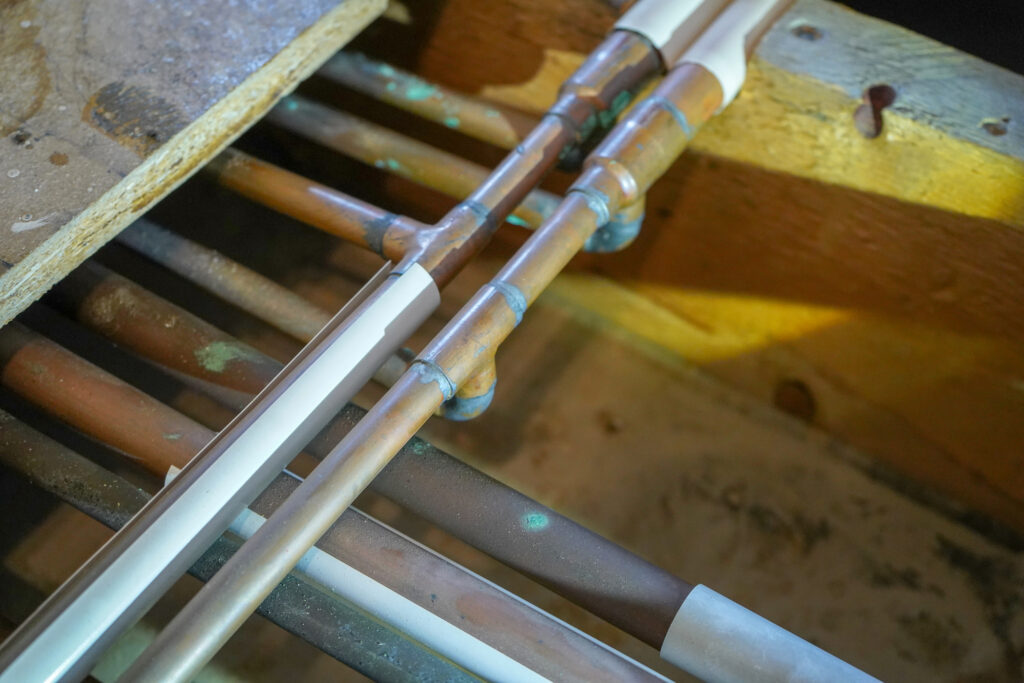 Close up of copper piping in a house

